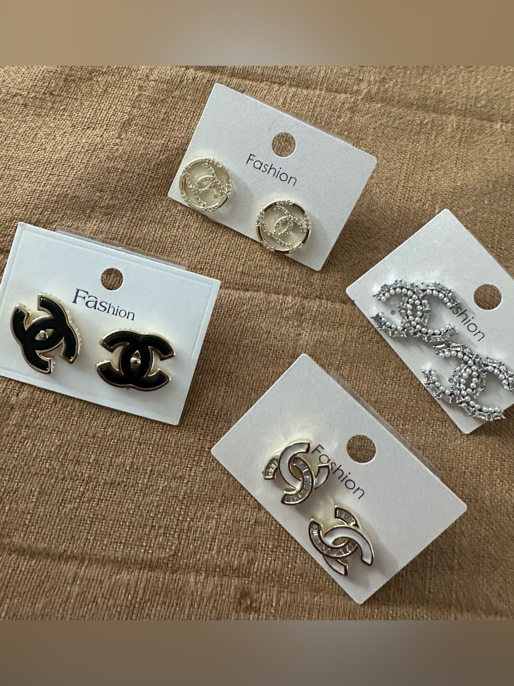 Gold Tone Interlocking Logo Stud Earrings - Fashion